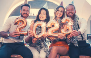 Young group celebrating New Year 2023